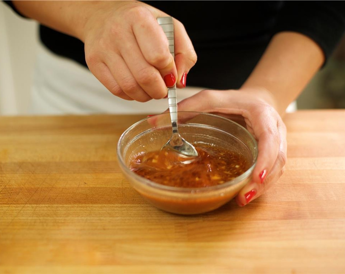 step 5 Stir the Tamari Soy Sauce (2 Tbsp), fresh ginger, Sriracha (1/2 Tbsp) garlic cloves, and Sesame Oil (1 tsp) into the cornstarch mixture and set aside.