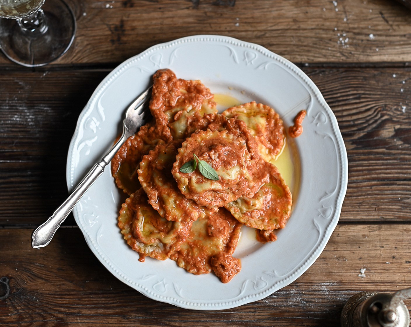 step 14 Plate the pasta in warmed bowls and spoon over the creamy tomato sauce. Finally, add a grating of Parmesan and a few fresh basil leaves. Serve and Enjoy!