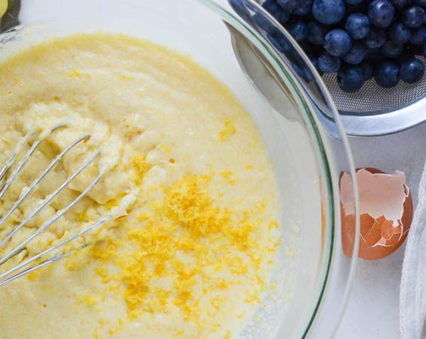 step 4 Zest the Lemon (1) and add lemon zest into the batter. Mix again so that zest is distributed throughout batter.