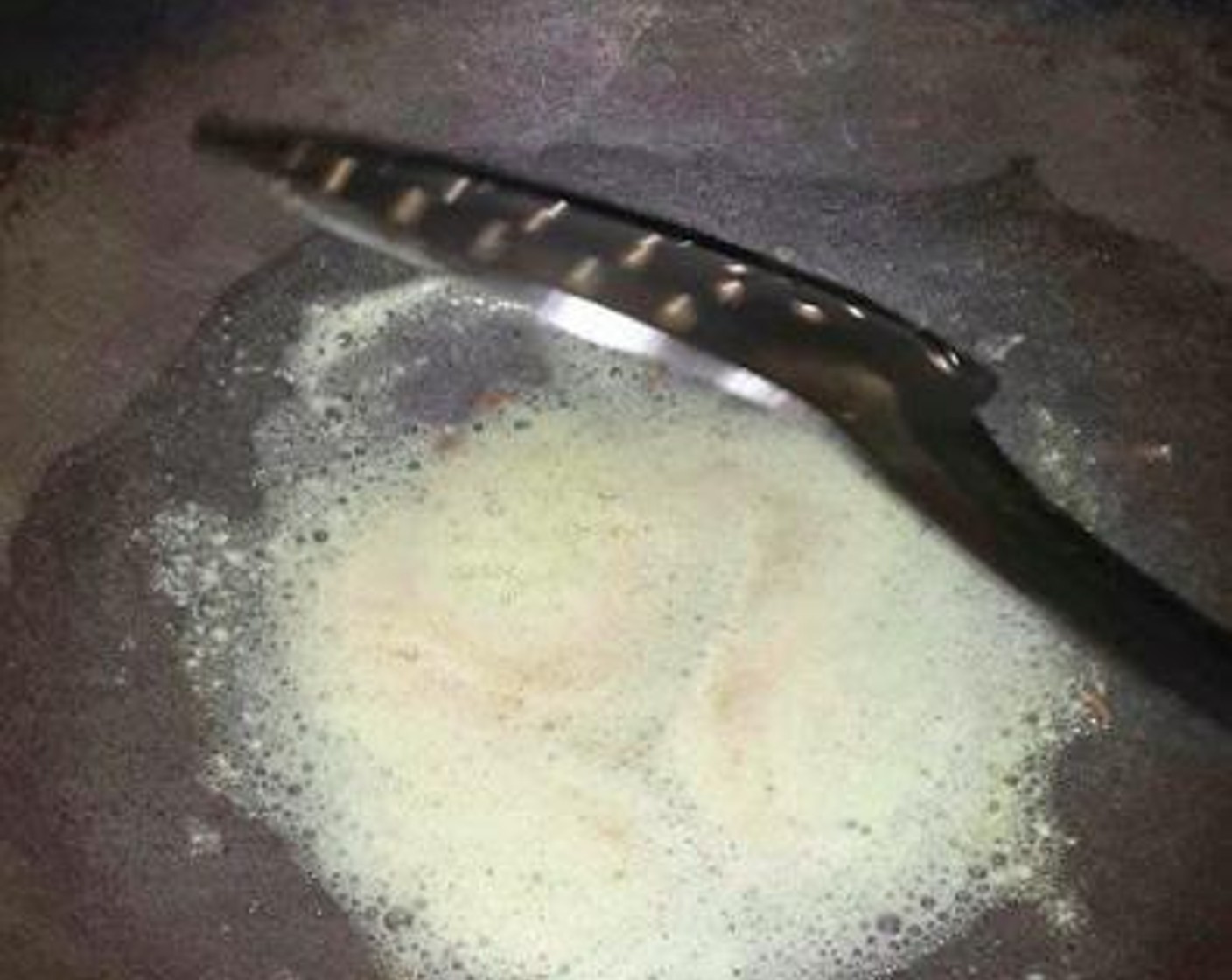 step 4 In a pan or kadai, add Oil (1 Tbsp) and Butter (2 Tbsp). Then add Cumin Seeds (1/2 tsp) and fry them till they get browned.