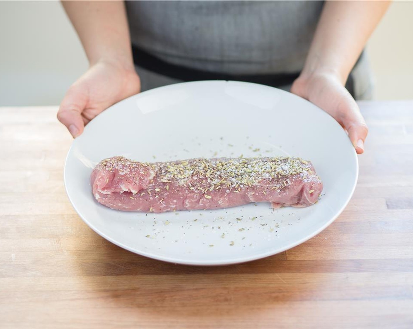 step 4 Meanwhile, pat Pork Tenderloin (1) with paper towels and place on a plate. Coat with Fennel Seeds (1/2 tsp), Salt (1/2 tsp) and Ground Black Pepper (1/4 tsp). Set aside.