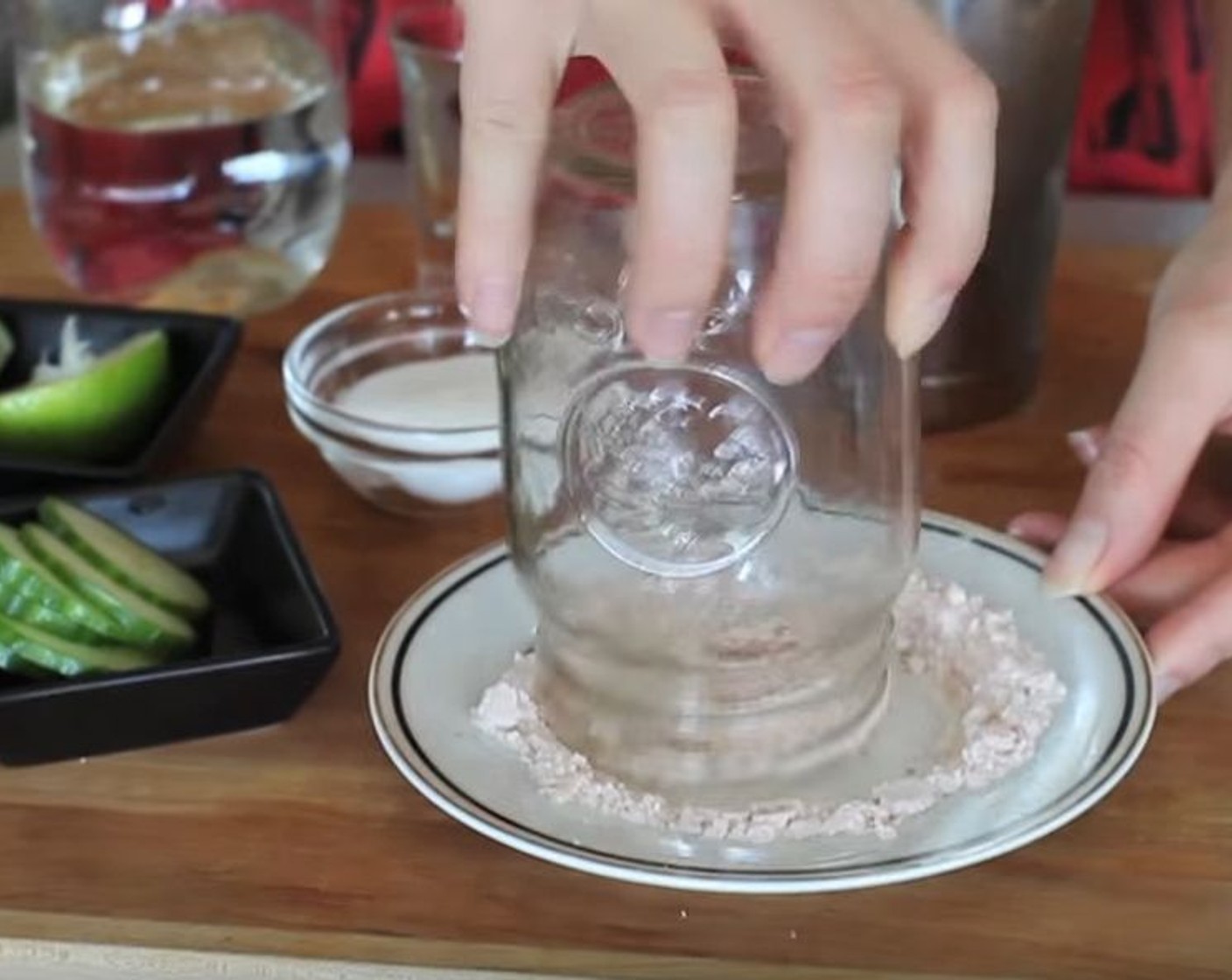 step 2 Then spin the glass around upside down in salted plate to coat the rim.