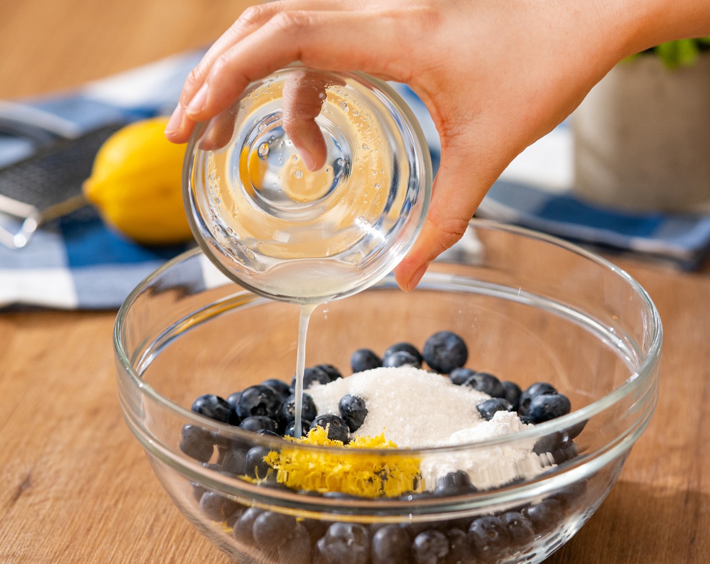 step 6 While dough chills, combine Fresh Blueberries (3 cups), Granulated Sugar (3 Tbsp), Corn Starch (1 Tbsp), Lemon (1), 1 Tbsp of Lemon Juice. Let sit for 15 minutes.