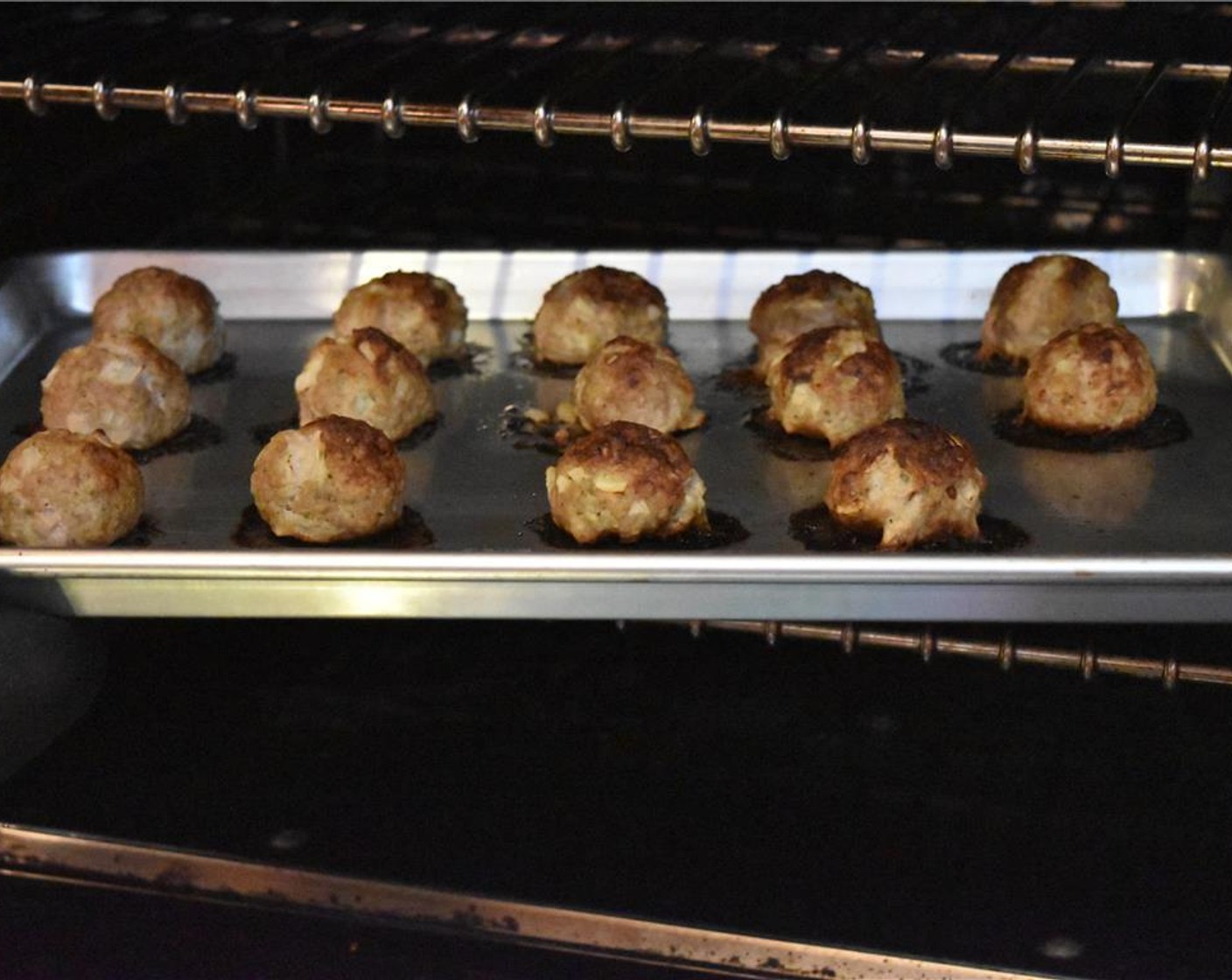 step 4 Turn off the broiler and set the oven to 350 degrees F (180 degrees C). Continue cooking the meatballs for another 5 minutes, or until they are cooked through.