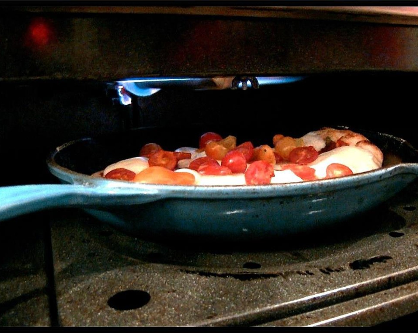 step 15 Rotate the skillet under the broiler 45 degrees and continue cooking for another 1-2 minutes, or until the cheese is golden and the crust is golden brown.