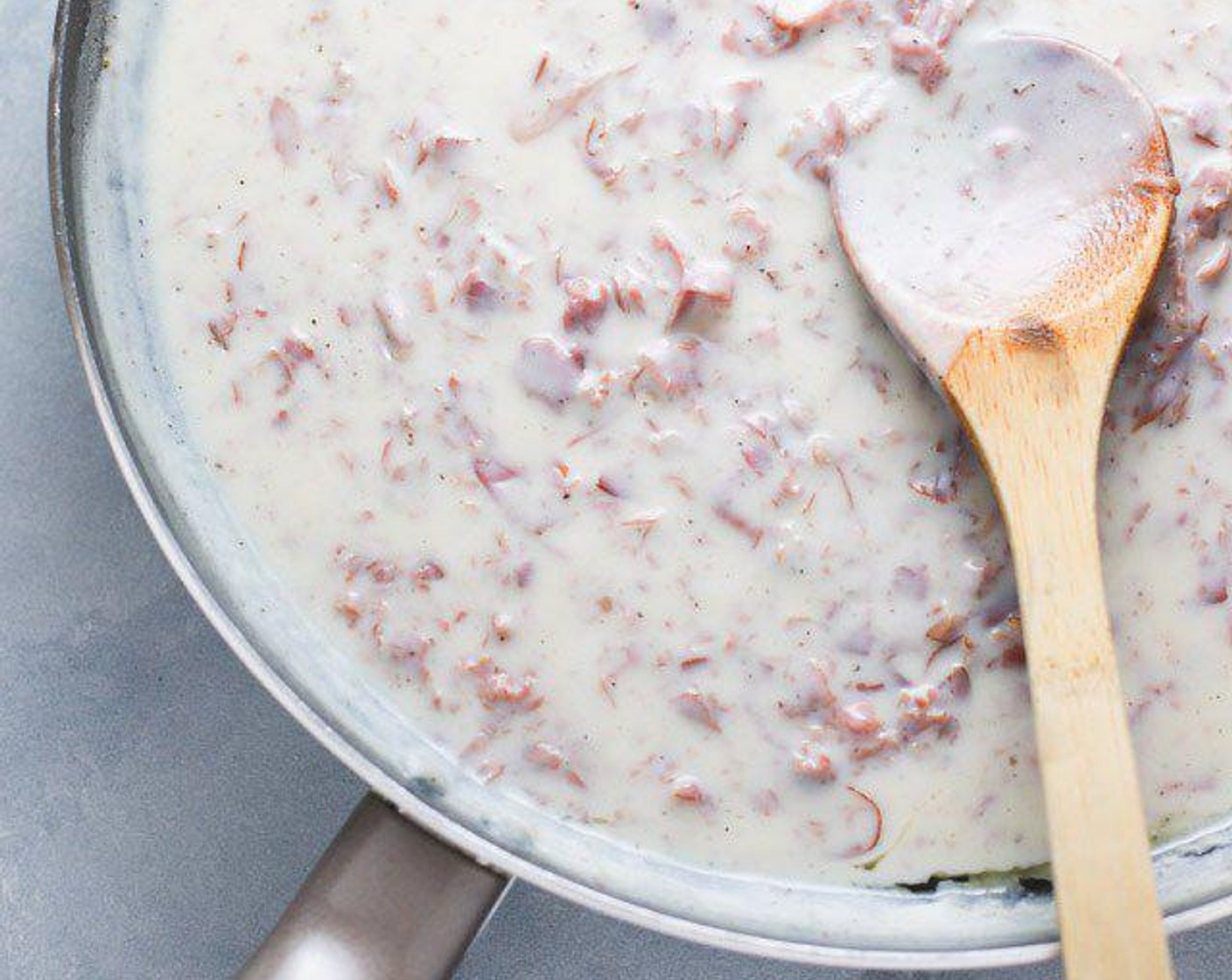 step 4 Add the 2% Reduced Fat Milk (3 cups), Salt (1/2 tsp) and Ground Black Pepper (1/2 tsp). Stir frequently and cook until it begins to thicken, about 10-15 minutes. If the mixture starts to boil rapidly, it is too hot and you should reduce your temperature.