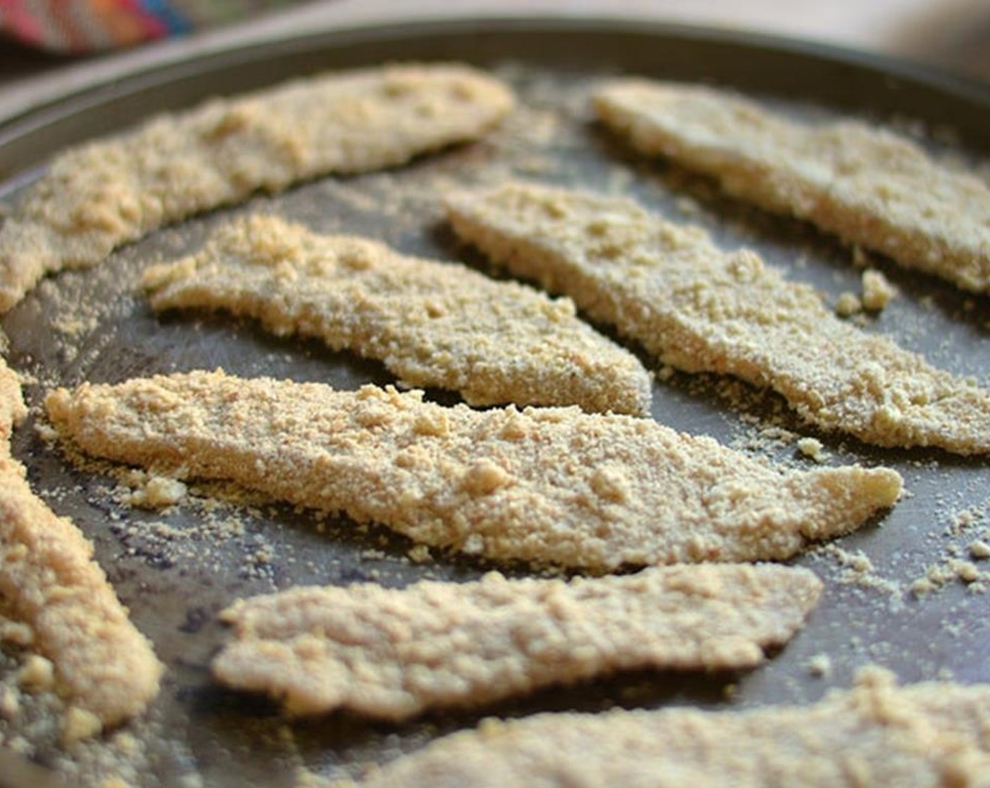 step 7 Arrange coated chicken fingers on a baking sheet and spray with Oil (as needed).