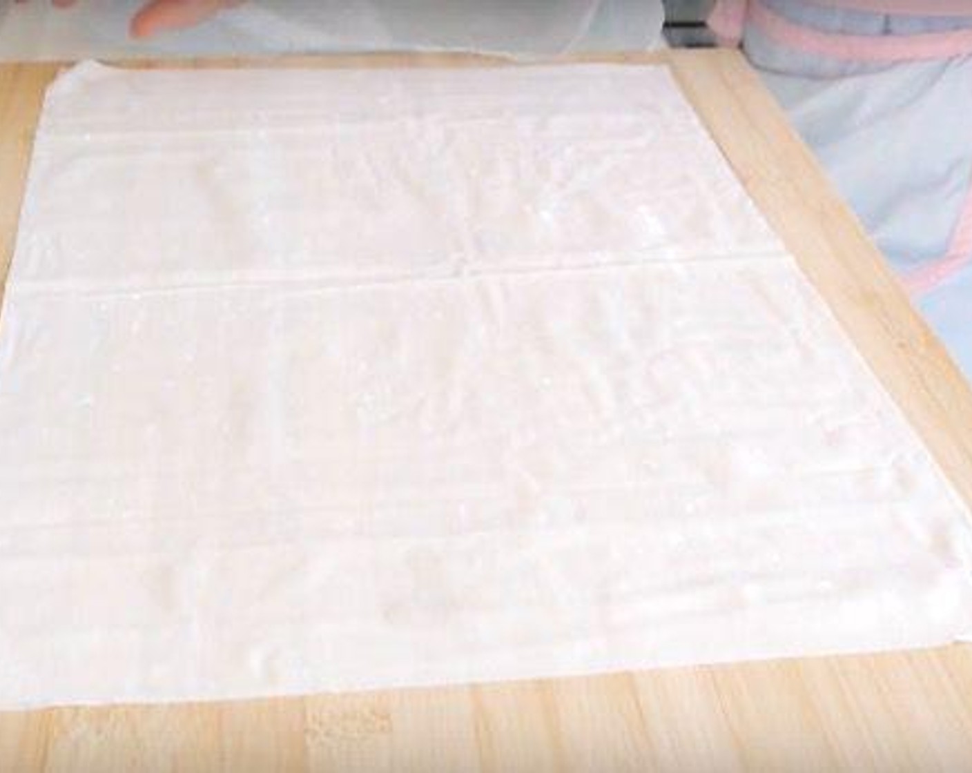 step 6 Once the filling is done we can start to make the pastries. Carefully unroll the Puff Pastry (12 sheets). I like to put a damp sheet of kitchen paper over the remaining sheets to delay drying out.