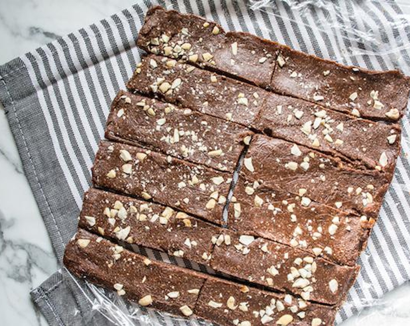 step 4 Refrigerate 15-20 minutes, then remove plastic and bars from 8x8 pan and cut into 12 even bars.