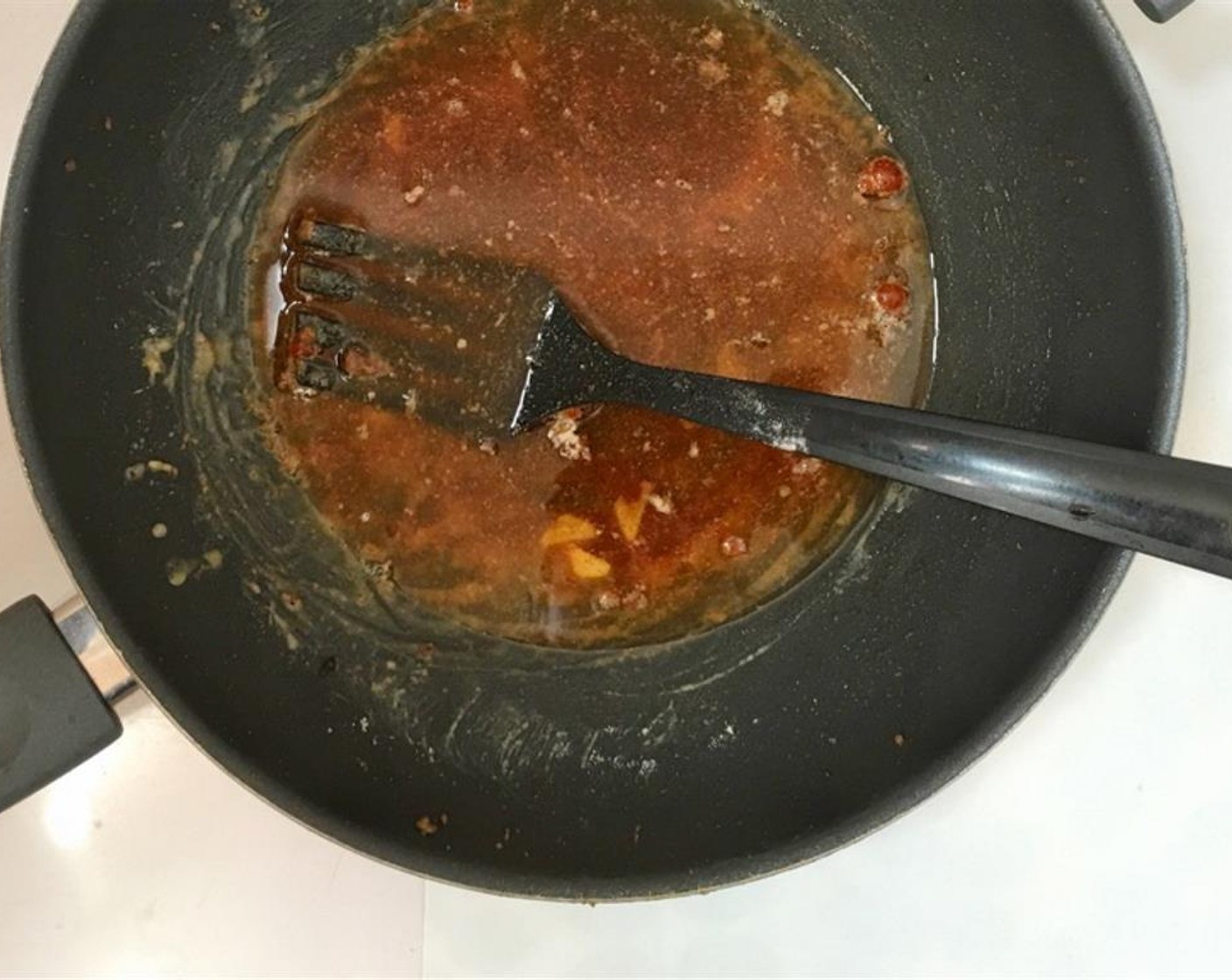 step 3 Stir well and cook the flour until it turns brown. Then add the Garlic (1 clove) and Chicken Stock (3/4 cup). Season with the Ground Cumin (1 tsp), Cayenne Pepper (1 tsp), Paprika (1 Tbsp), and a pinch of Salt (to taste) and Ground Black Pepper (to taste).