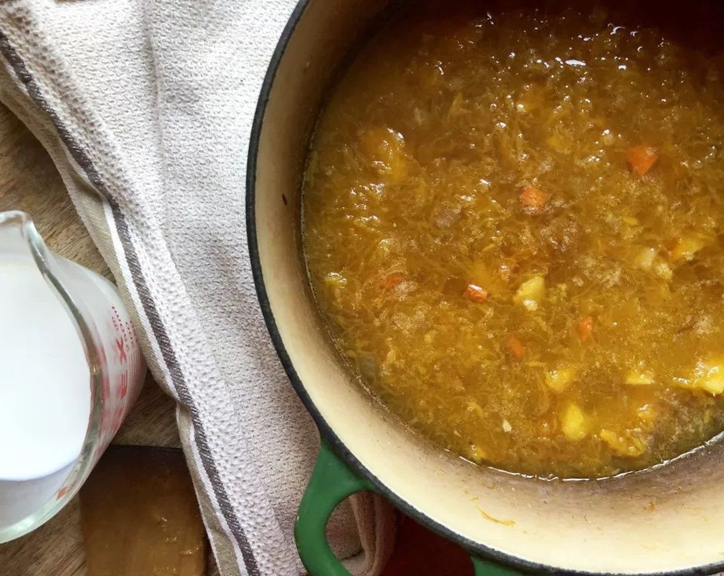 step 7 Remove 3/4 cup vegetables; set aside. Add Chicken Stock (4 cups) to dutch oven or pan. Cook over medium heat 12 minutes.