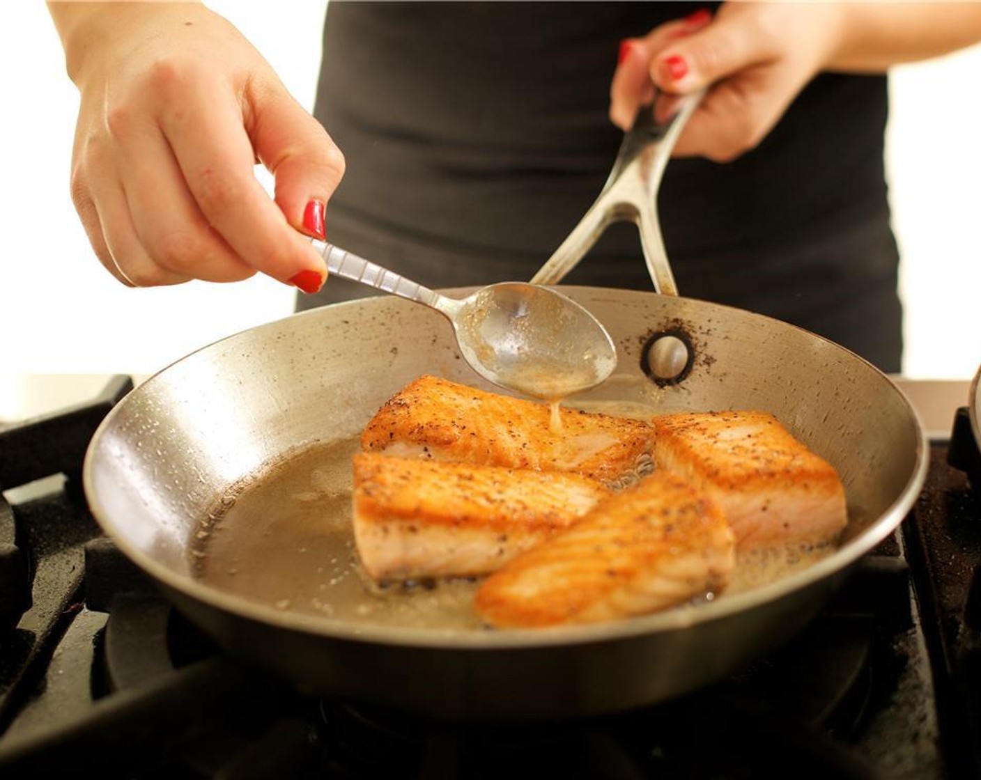 step 15 Add the remaining Butter (2 Tbsp) and the remaining lemon juice. Turn the fish over and use a spoon to continuously baste with the butter and lemon sauce for another three minutes. Turn off the heat and hold until plating.