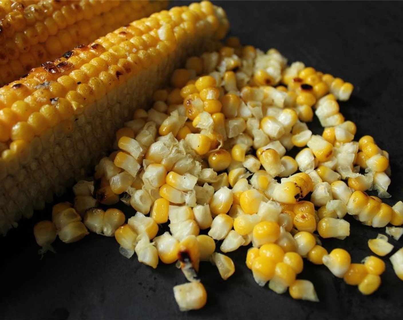 step 7 Remove corn from the pan and let cool. When the corn is cool enough to handle, use a sharp knife to slice the kernels from the cob. Set aside until ready to use.