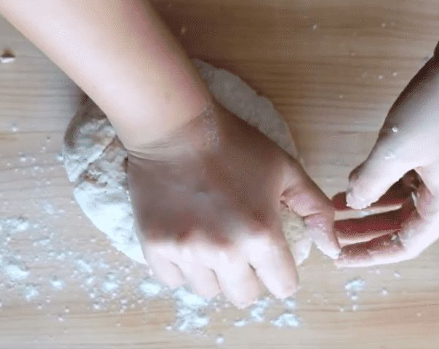 step 3 Turn the dough out onto a lightly floured board and knead it gently, adding a little extra flour as needed, until the dough is as soft as an earlobe.