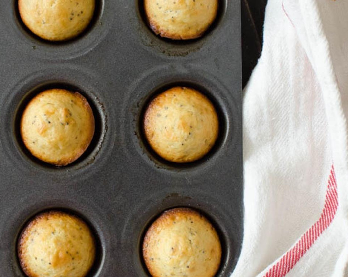 step 5 Remove from oven and and let cool for 5 minutes before turning the muffins out onto a wire cooling rack.