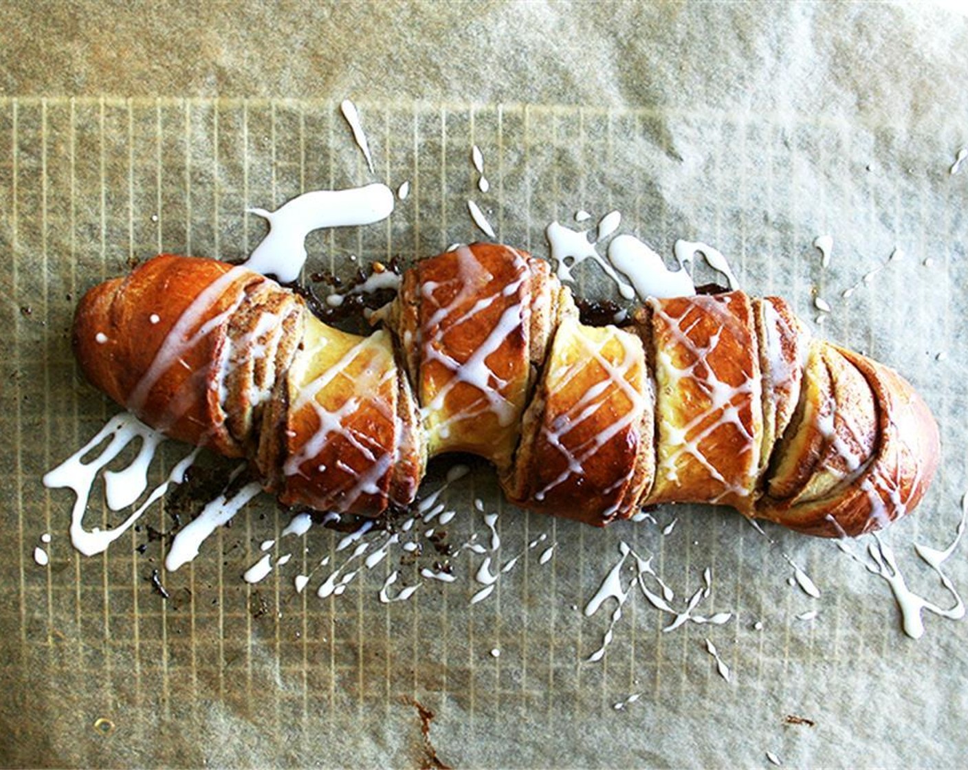 step 11 Let cool slightly. Whisk the Powdered Confectioners Sugar (1 cup) and Milk (2 Tbsp) together. Drizzle over the top and serve.