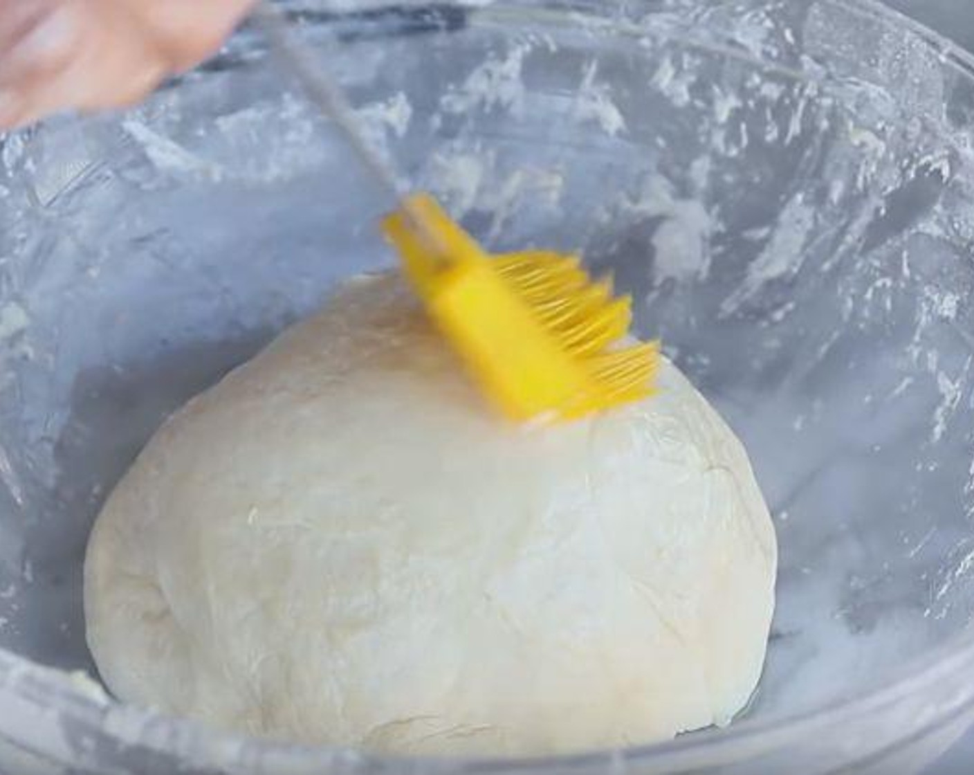 step 3 Oil the bowl, place the dough in the bowl, brush the top and sides of the dough, cover with plastic wrap or kitchen towel and let the dough double in size for 1 1/2 hours.