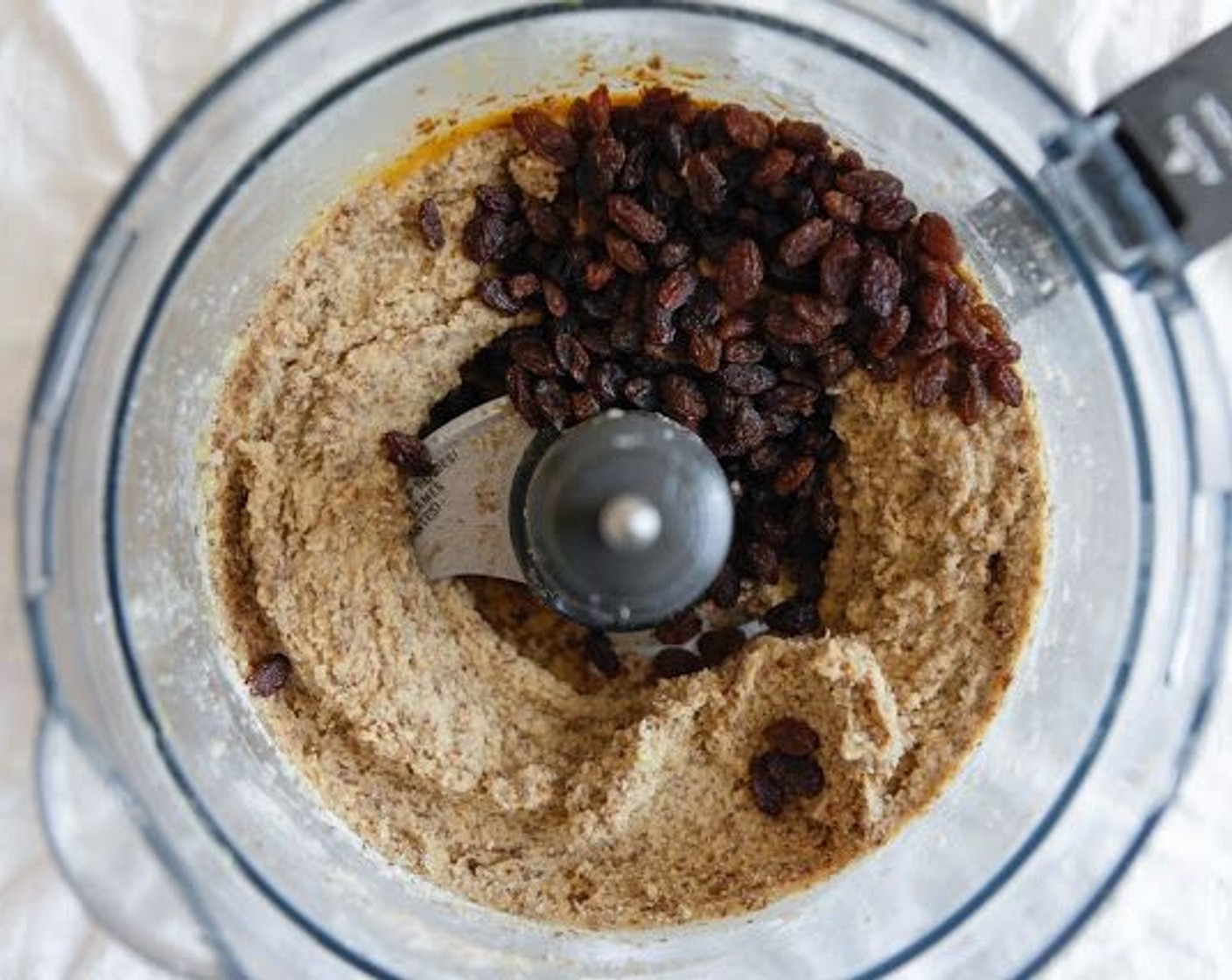 step 5 Then add Sun-Maid Raisins (4 Tbsp) and pulse gently, not completely as you want to keep some raisins whole.