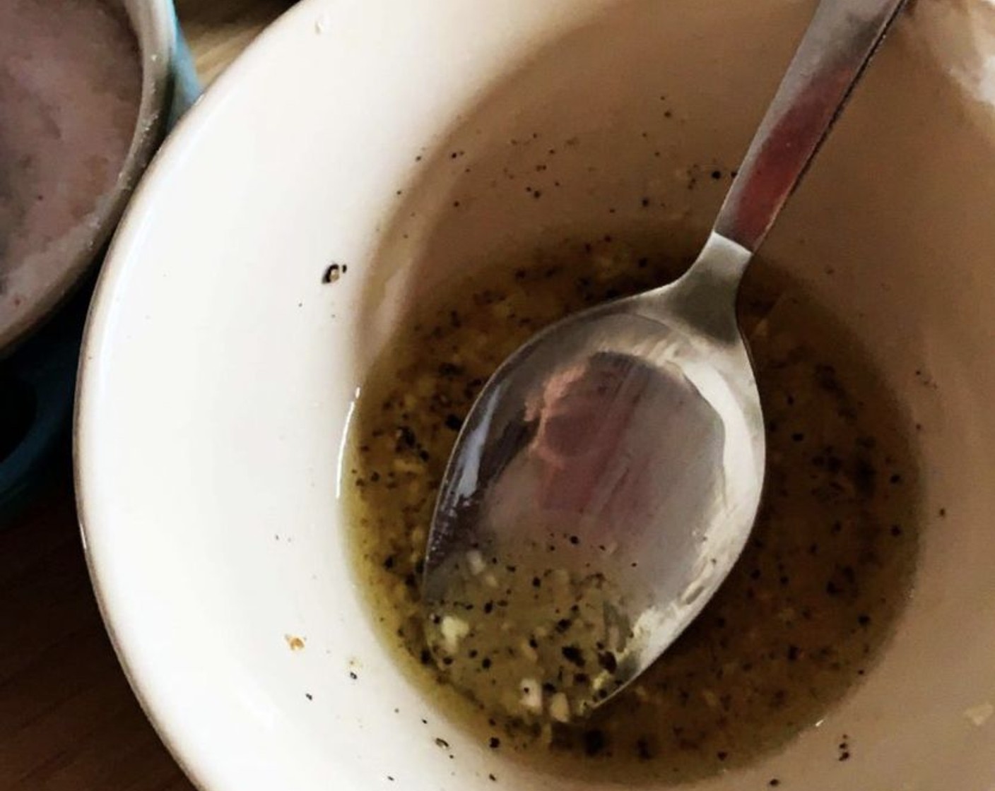 step 3 In a small bowl, combine Extra-Virgin Olive Oil (2 Tbsp), Garlic (2 cloves), Himalayan Rock Salt (1/2 tsp), Ground Black Pepper (1/4 tsp), and Coconut Vinegar (2 Tbsp). Stir them well and pour them on top of the salad.