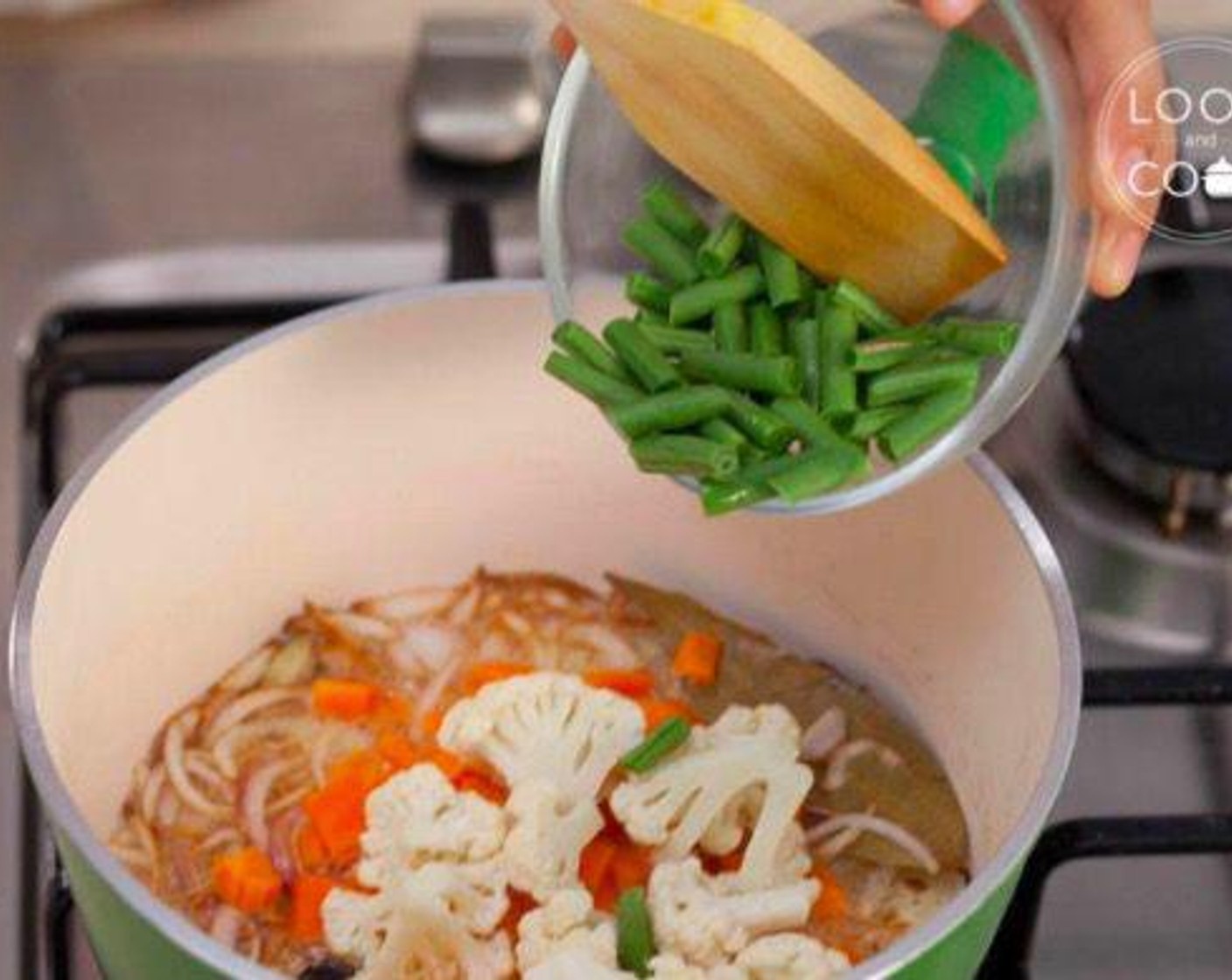 step 4 Add Carrot (2/3 cup), Cauliflower (3/4 cup), Green Peas (1/2 cup), French Beans (1/2 cup) and saute.