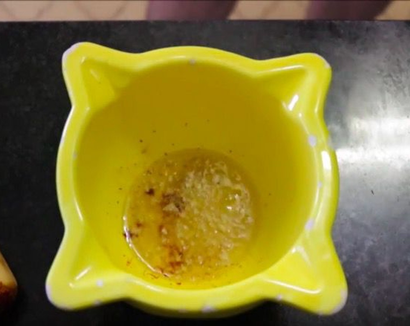 step 11 Add the mixture into the mortar with the saffron and let it infuse for 3 minutes or until it cools off.