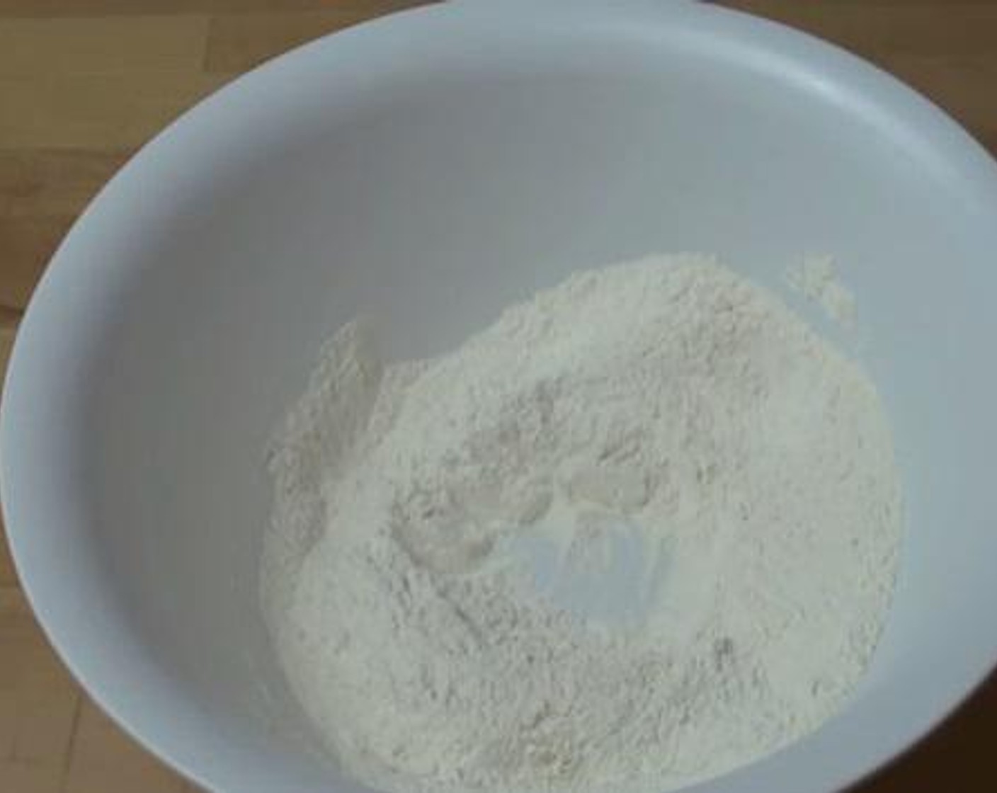 step 1 In a mixing flour, mix together the Self-Rising Flour (2 cups), Caster Sugar (1/4 cup), and Baking Soda (1/4 tsp). Stir the mixture well.
