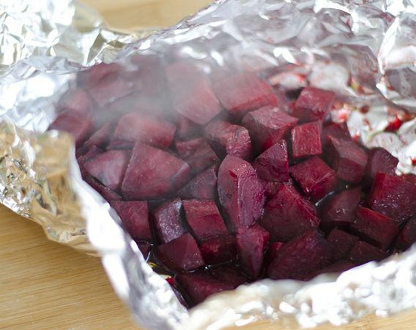 step 2 Trim, peel, and chop Beets (2) into 1/2-inch cubes. Drizzle with a little bit of Extra-Virgin Olive Oil (1 Tbsp) and place in an aluminum foil pouch.