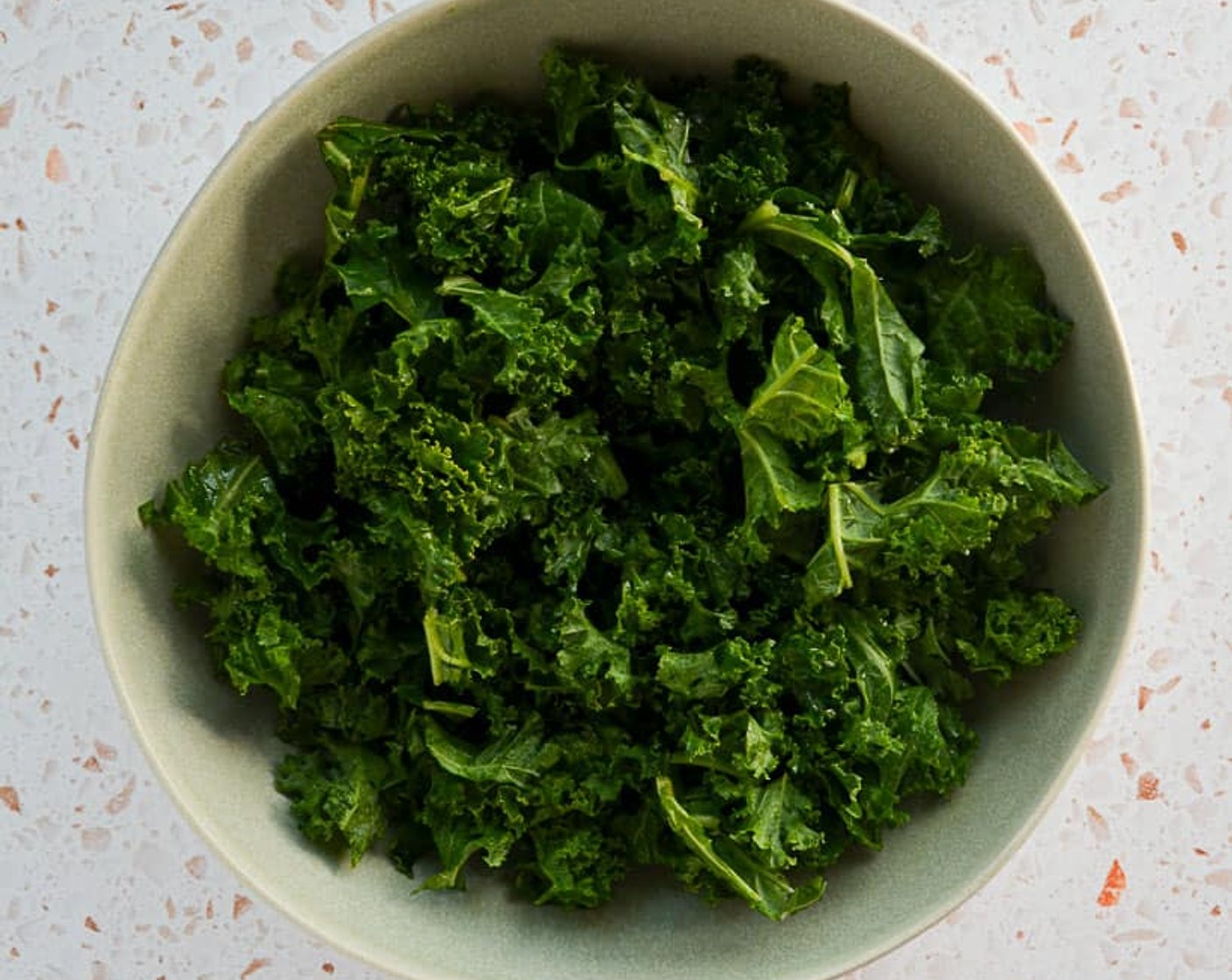 step 1 Shred and de-stem the Kale (11 1/3 cups). Massage the kale in a large serving bowl.