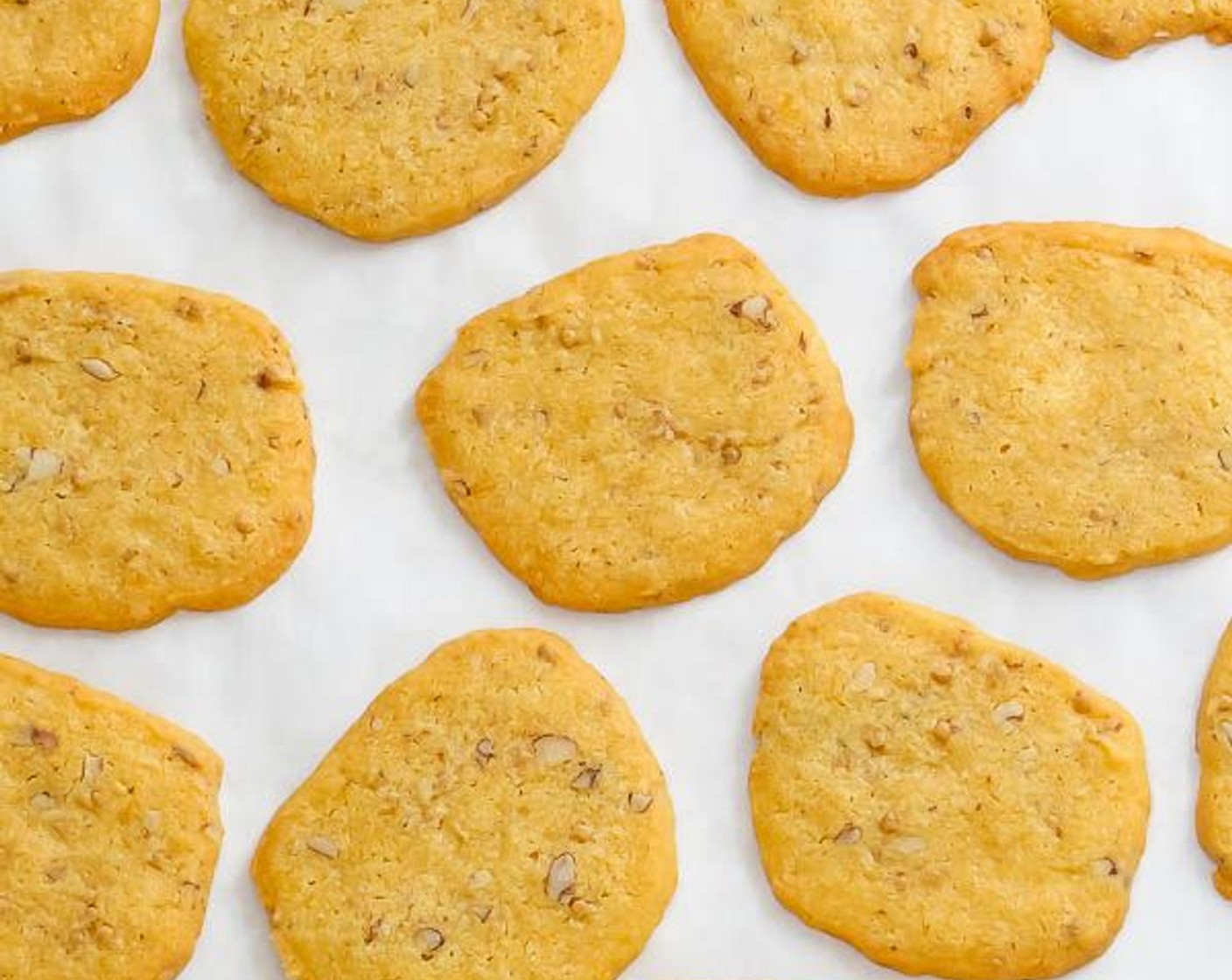 step 8 Bake in batches, switching positions of the pans halfway through the baking process. Cook a total of 12-15 minutes until lightly golden. Transfer crackers to racks to cool.