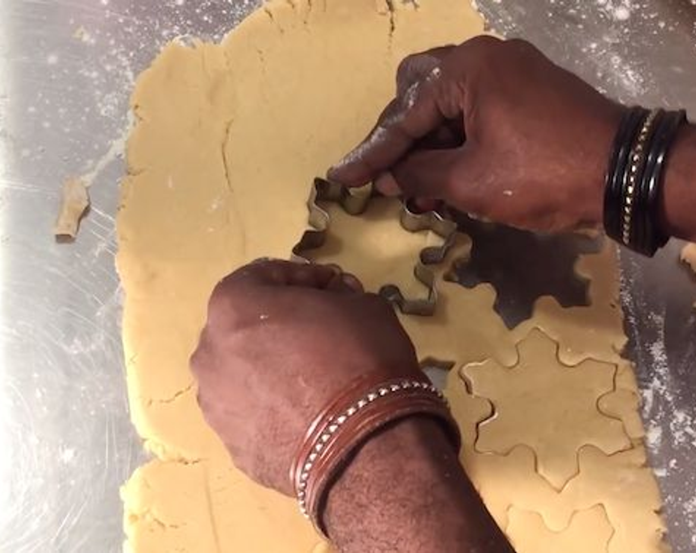 step 9 Using a cookie cutter cut out the cookies. Place cookies on a tray lined with parchment paper.