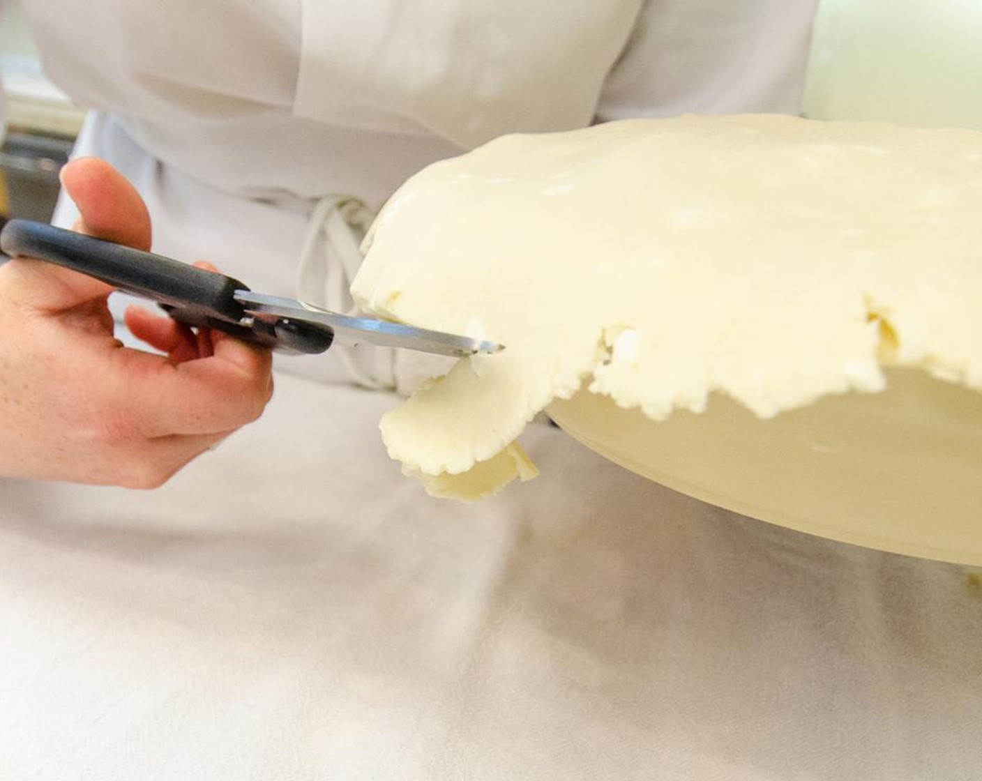 step 22 Trim dough edges, leaving 1/2-inch overhang.