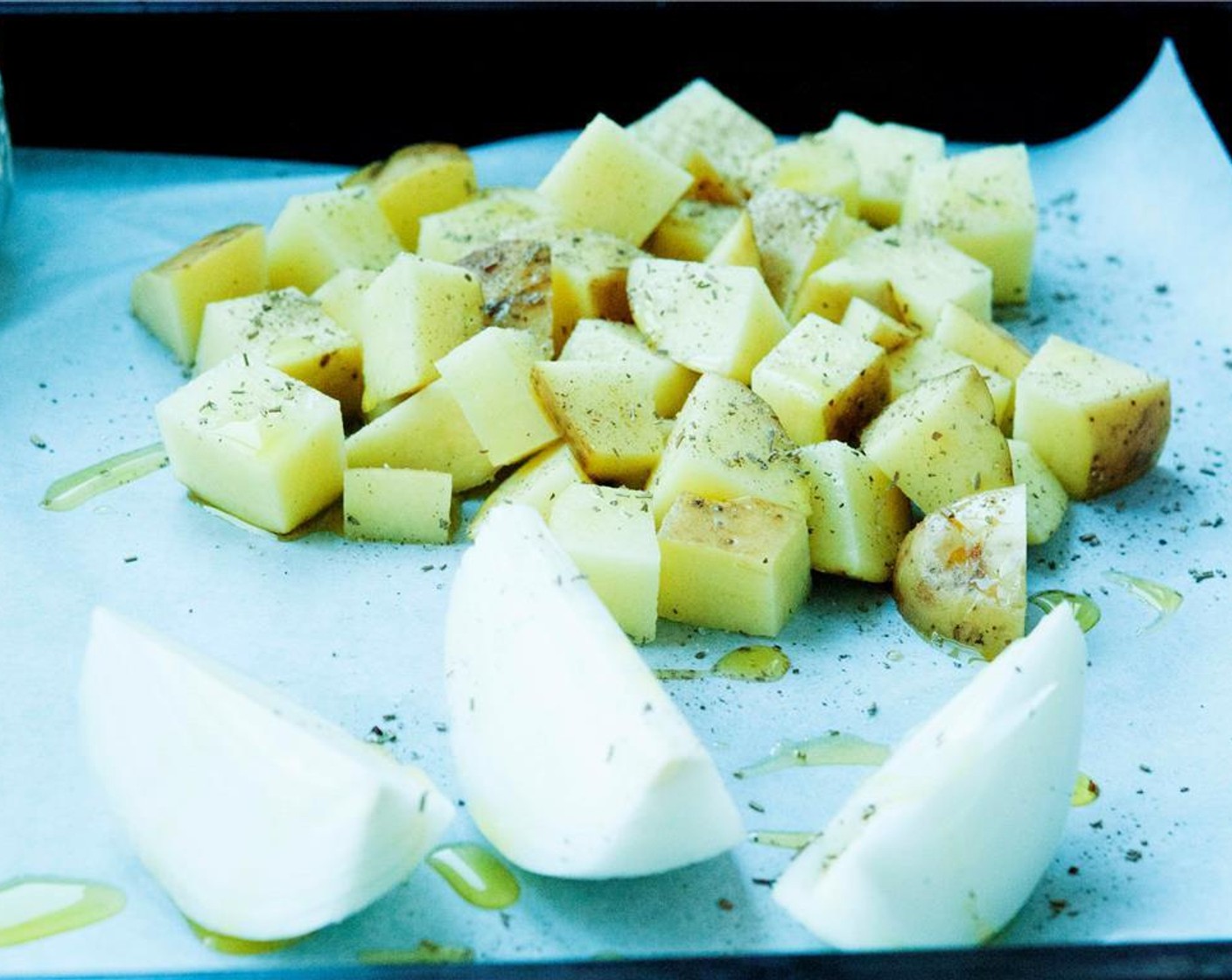 step 10 Slice the Onion (1) into wedges and dice the Potatoes (2). Dress them with Salt (to taste), Ground Black Pepper (to taste), and a drizzle of Extra-Virgin Olive Oil (1/4 cup).