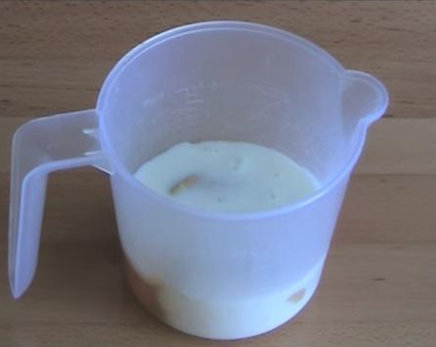 step 2 In a mixing jug, mix the Egg (1), Yellow Mustard (1/2 Tbsp), and Milk (1/2 cup).