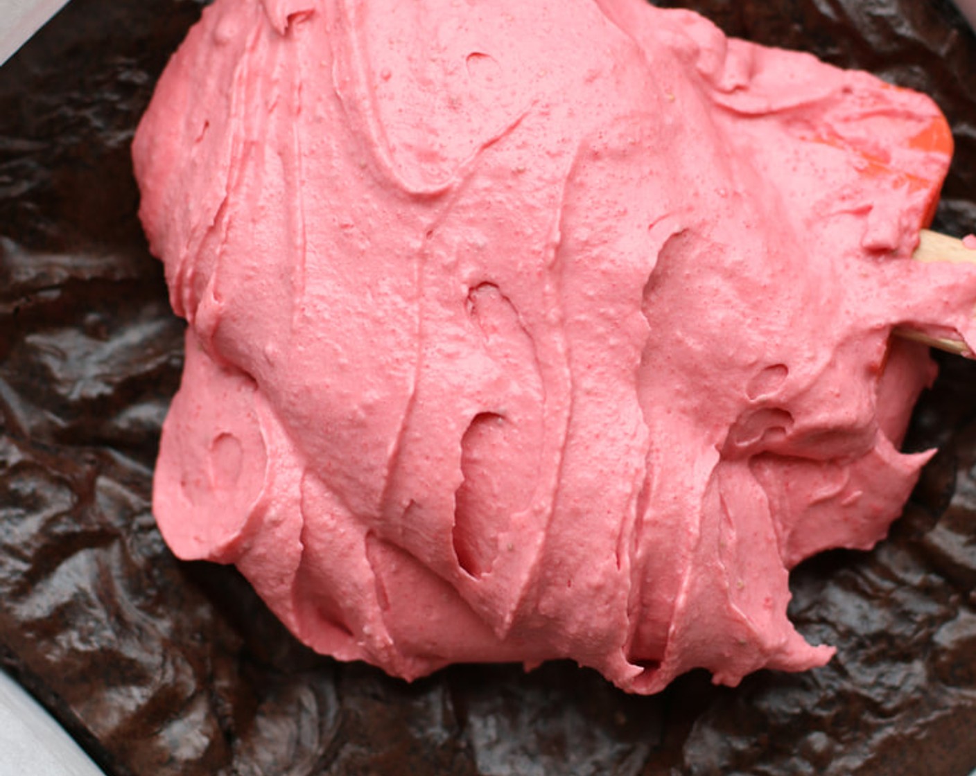 step 11 Spread Strawberry Cheesecake Truffle Filling evenly over completely cooled brownies. Cover the pan with foil and allow to chill for several hours, this will “set” the filling.