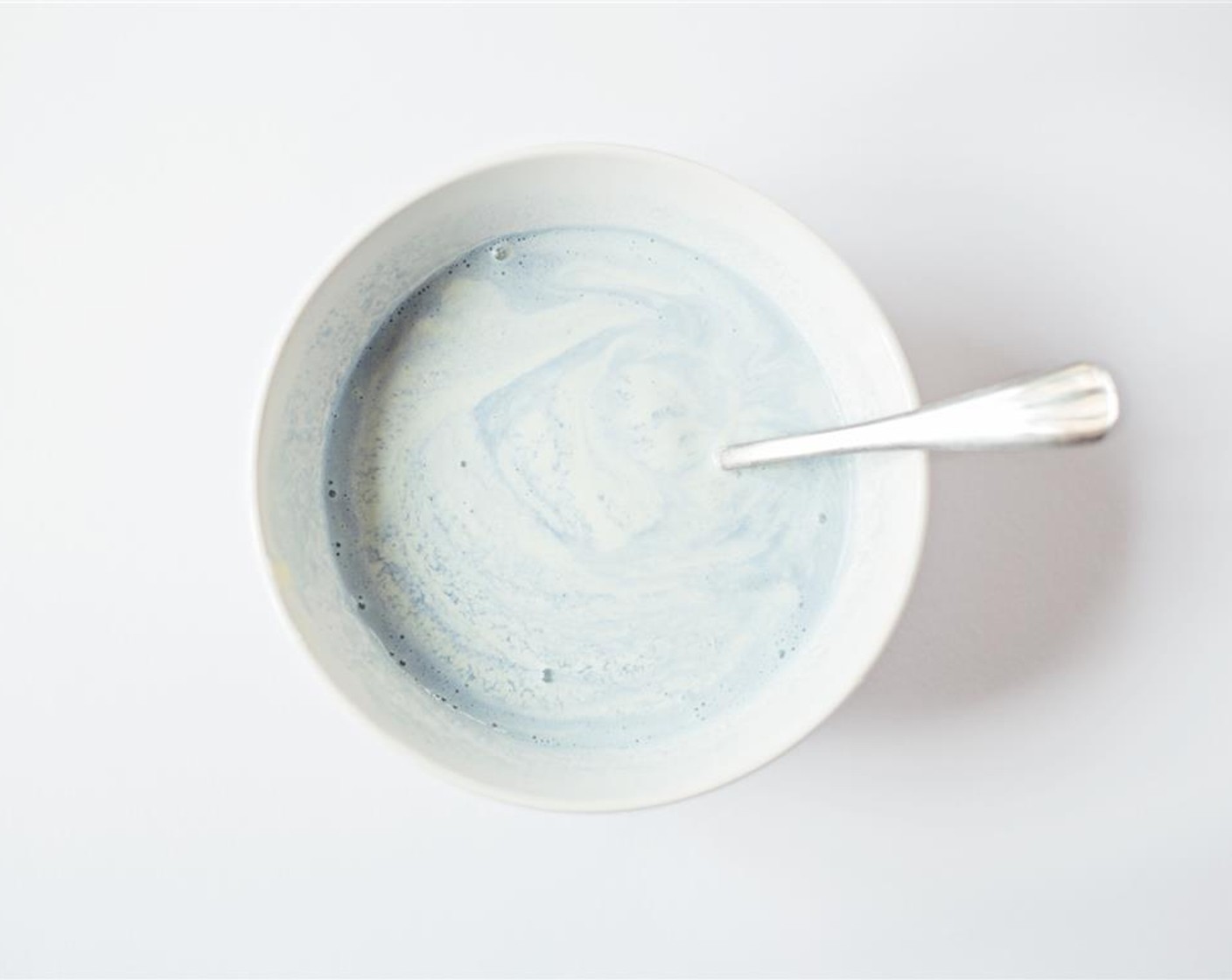 step 3 Add the Vanilla Ice Cream (640 g) to a bowl and slowly incorporate the infused water.