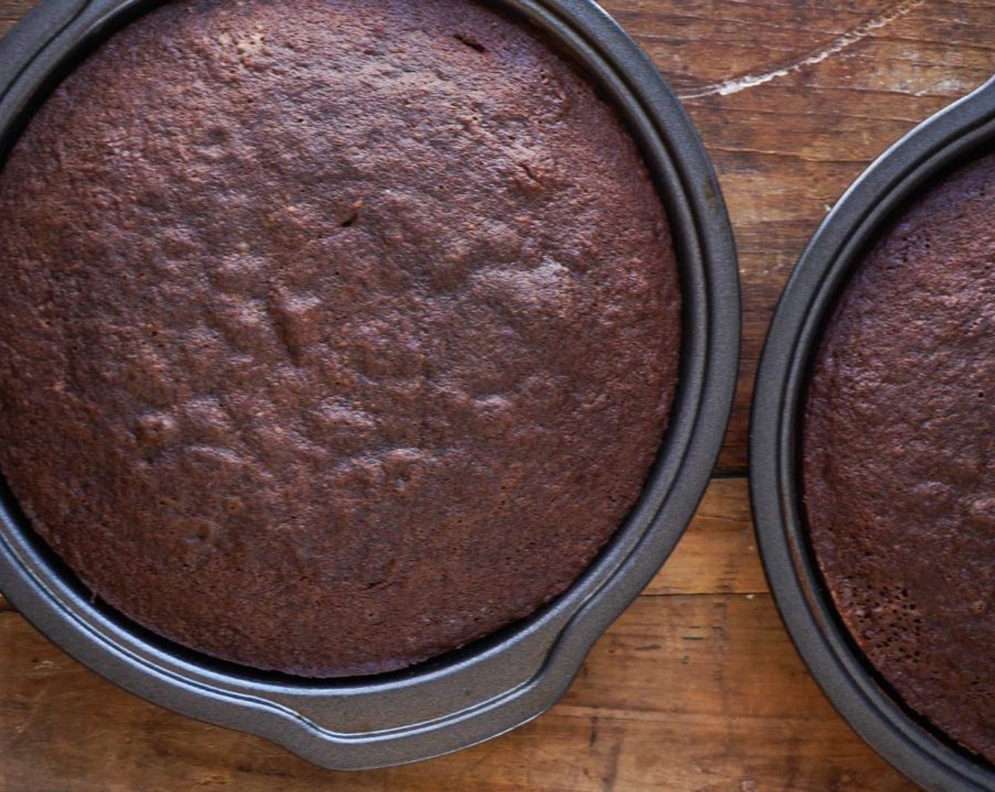 step 7 Pour into prepared pans, smooth the top, and bake for 25-35 minutes, or until a cake tester comes out clean.