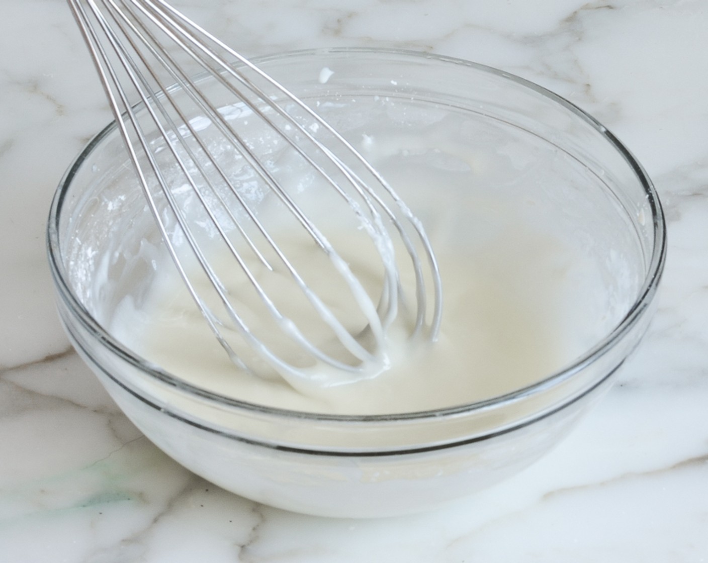 step 13 Meanwhile, make the glaze. In a medium bowl, whisk together the Philadelphia Original Soft Cheese (1 1/2 Tbsp), Buttermilk (2 Tbsp) until thick and smooth. Add Powdered Confectioners Sugar (3/4 cup) and whisk until smooth glaze forms.