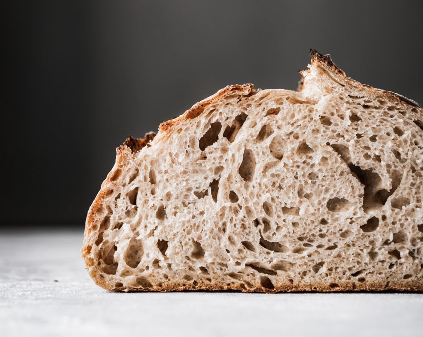 step 33 Sourdough loaves keep best stored at room temperature in a bread bag or box if you are going to eat the entire loaf within the first day. Leftover sourdough is best when toasted. To preserve the freshness of your leftover sourdough, slice and freeze any leftovers.