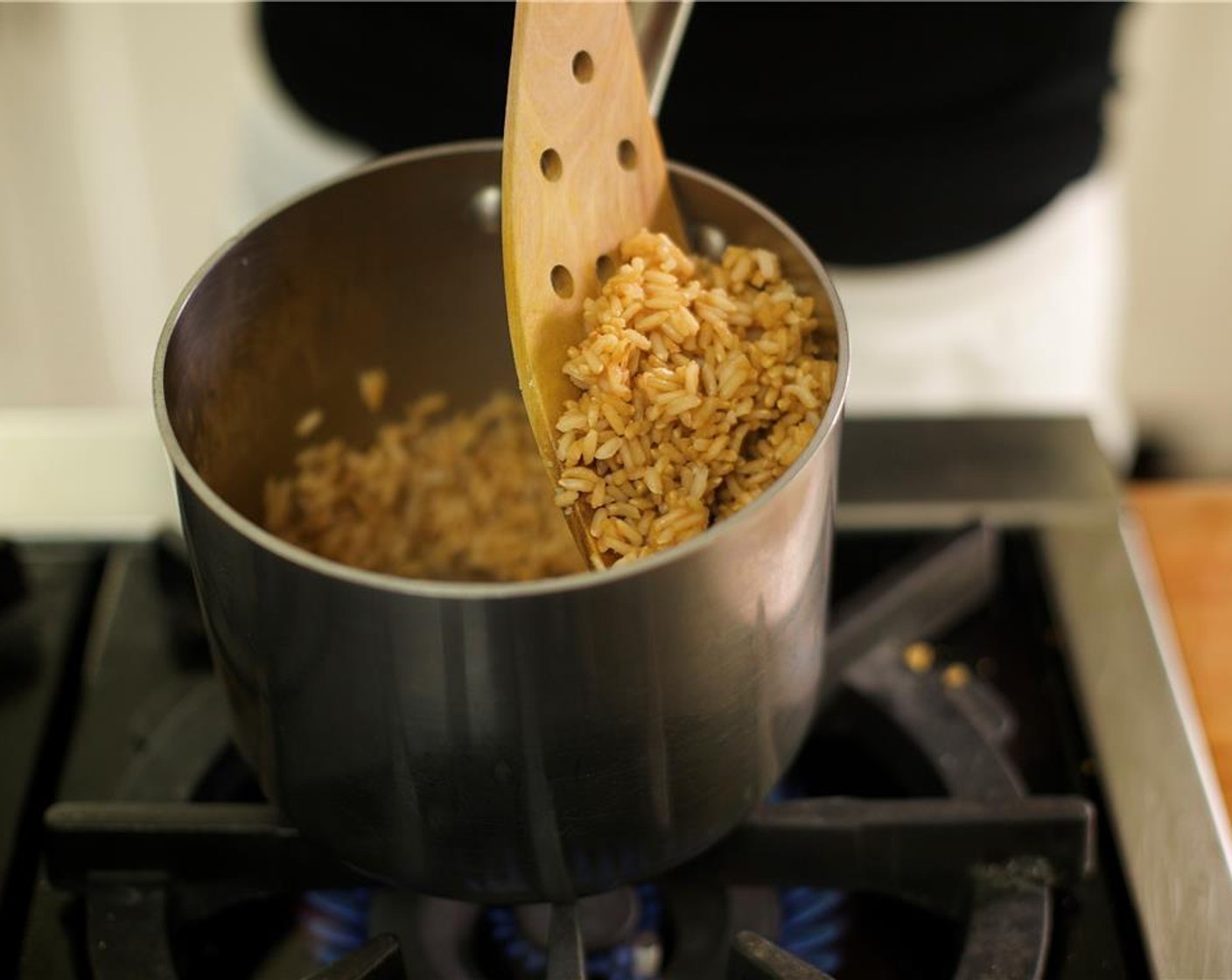 step 6 Into a small saucepan, pour the Mahatma® 100% Whole Grain Brown Rice (2/3 cup) one cup of water and the Vegetable Base (1 pckg). Stir. Bring to a boil over medium high heat. When water begins to boil, stir once, cover, and reduce heat to low. Simmer for 23 minutes.