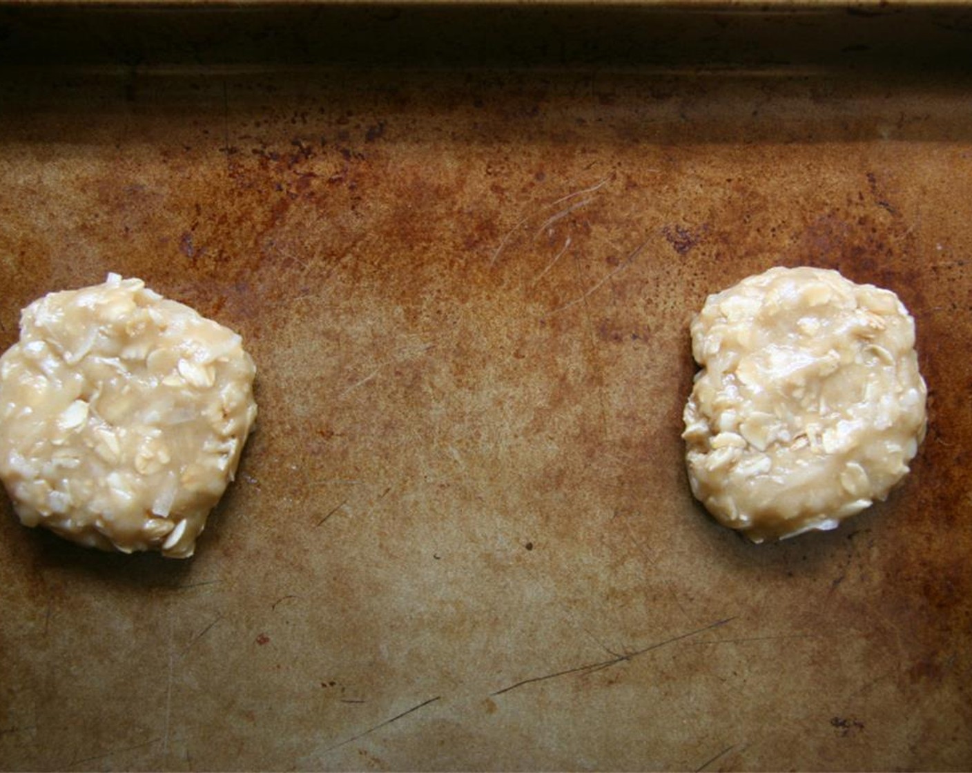 step 5 Roll into balls and place 2 inches apart on baking sheets. Press down to flatten slightly.