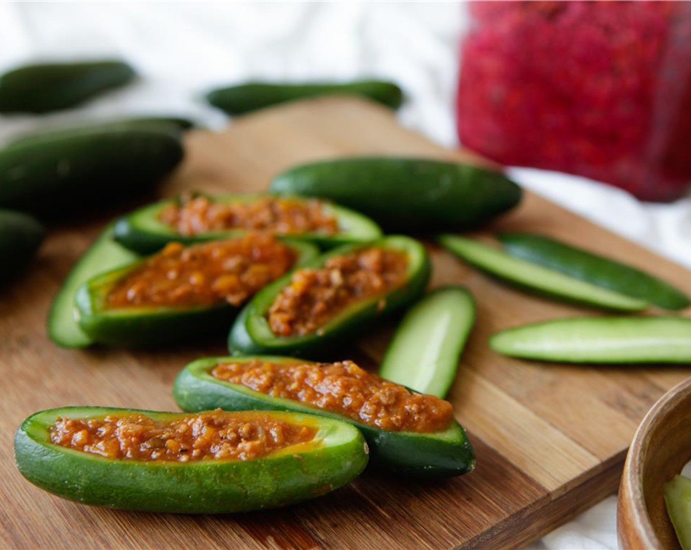 step 3 Add some Bolognese Sauce to each cucumber boat.