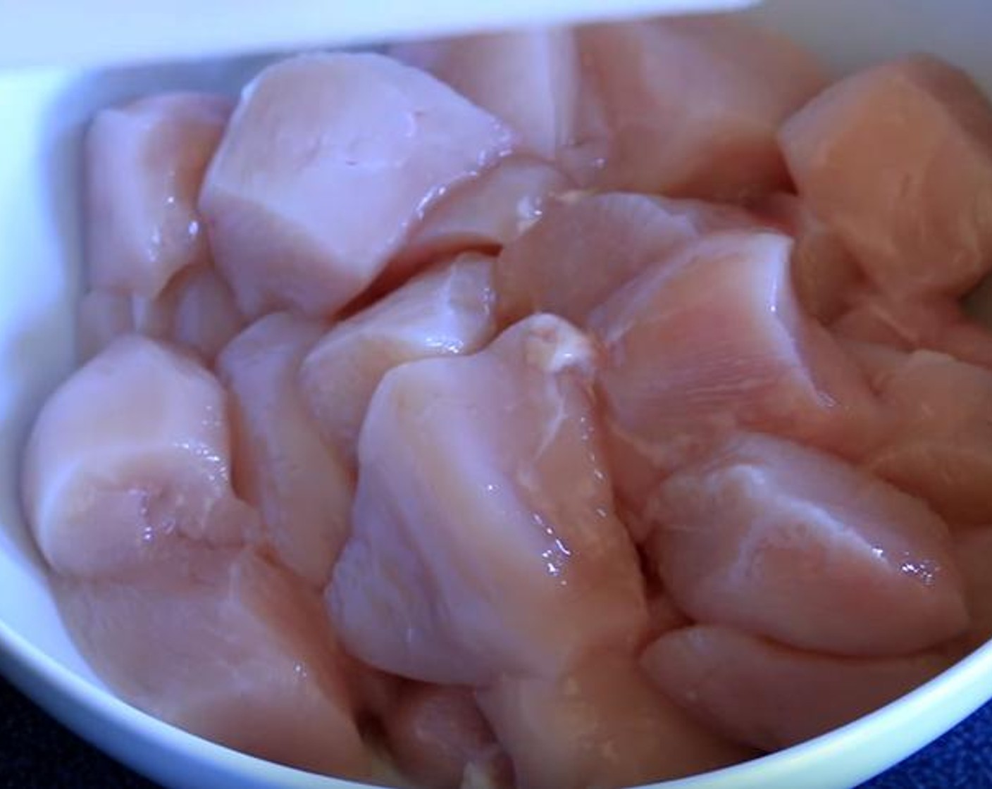 step 1 Cut Chicken Breasts (2 lb) into pieces. Put them in a bowl.