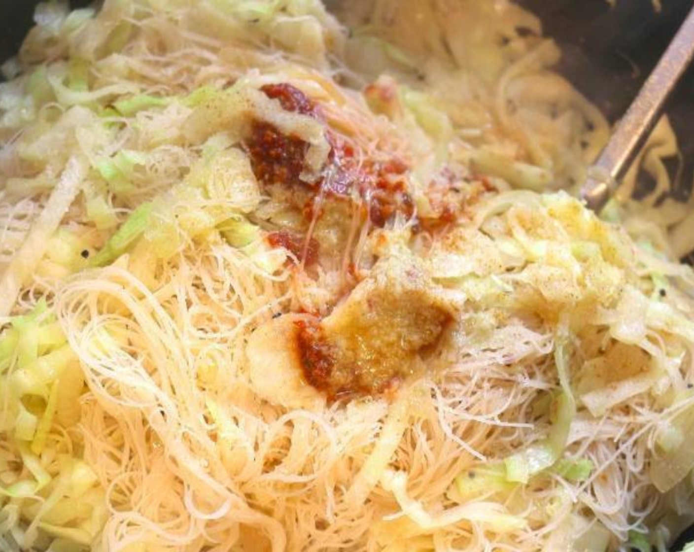 step 4 Add Rice Noodles (12 oz) and Chicken Stock (2 cups), and mix very well. After a few minutes, remove from heat, then check/adjust seasoning.