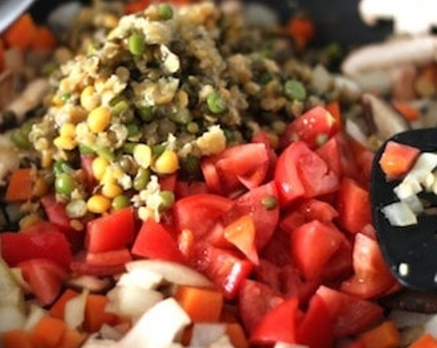 step 7 Add the boiled lentils, cut tomatoes and mix well.