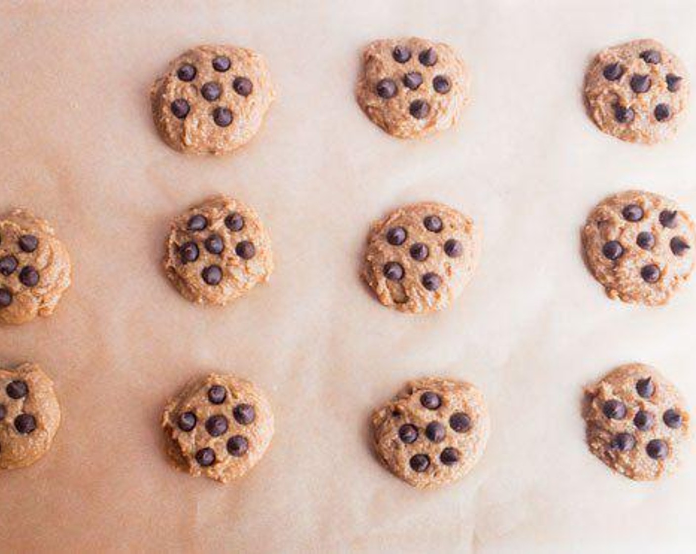 step 5 Scoop 11-12 spoonfuls of dough onto cookie sheet- they get much bigger when baked!