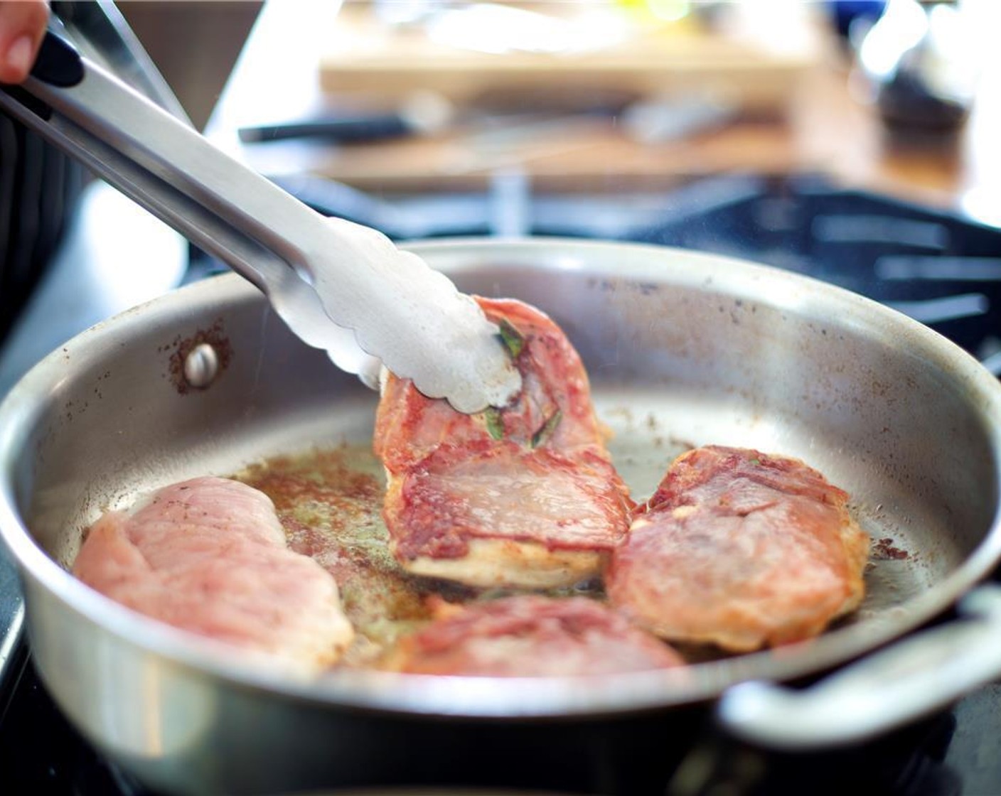 step 5 Heat Olive Oil (1 Tbsp) and half of the remaining Butter (1 Tbsp) in a large saute pan over medium-high heat. When butter is melted, add turkey cutlets with the prosciutto face down and cook for 2 minutes.