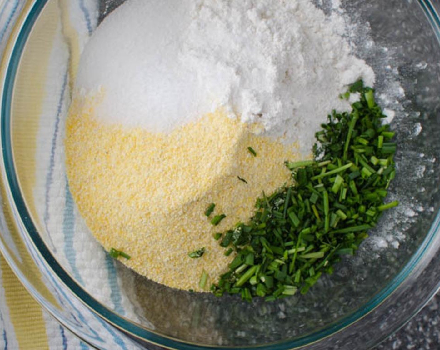 step 8 In a medium bowl, combine the Cornmeal (4 Tbsp), Self-Rising Flour (1 cup), Kosher Salt (1/2 tsp), Granulated Sugar (1 tsp), and Fresh Chives (2 Tbsp).
