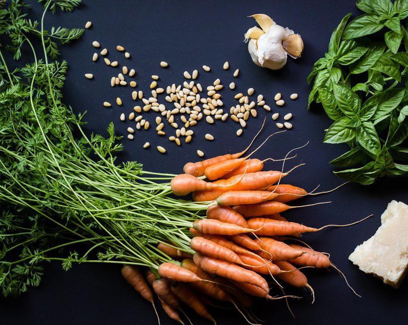 step 2 Clean the Baby Carrots (1 bunch) and remove the carrot tops. Set aside the tops.