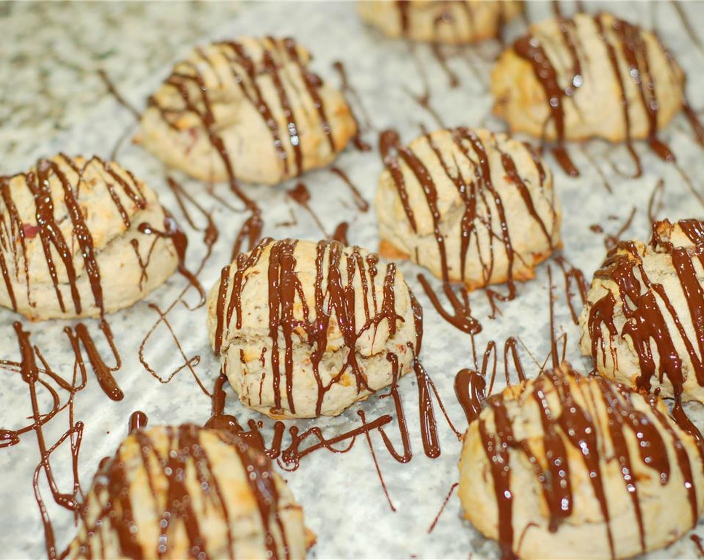 step 7 Melt Semi-Sweet Chocolate Chips (3/4 cup) according to package instructions. Then, using a fork or Ziploc bag with tip cut off, drizzle each scone with chocolate. Allow the chocolate to set and enjoy!