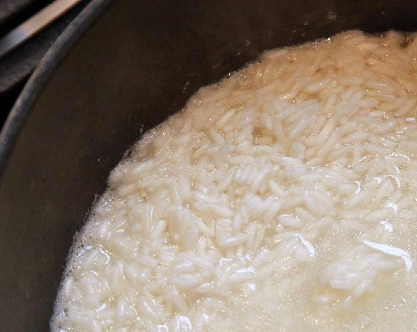 step 9 Place the pot on high heat and bring to a  boil, then turn the heat down to medium-low, cover and cook about 12 minutes, or until all the liquid has been absorbed and the rice is tender.